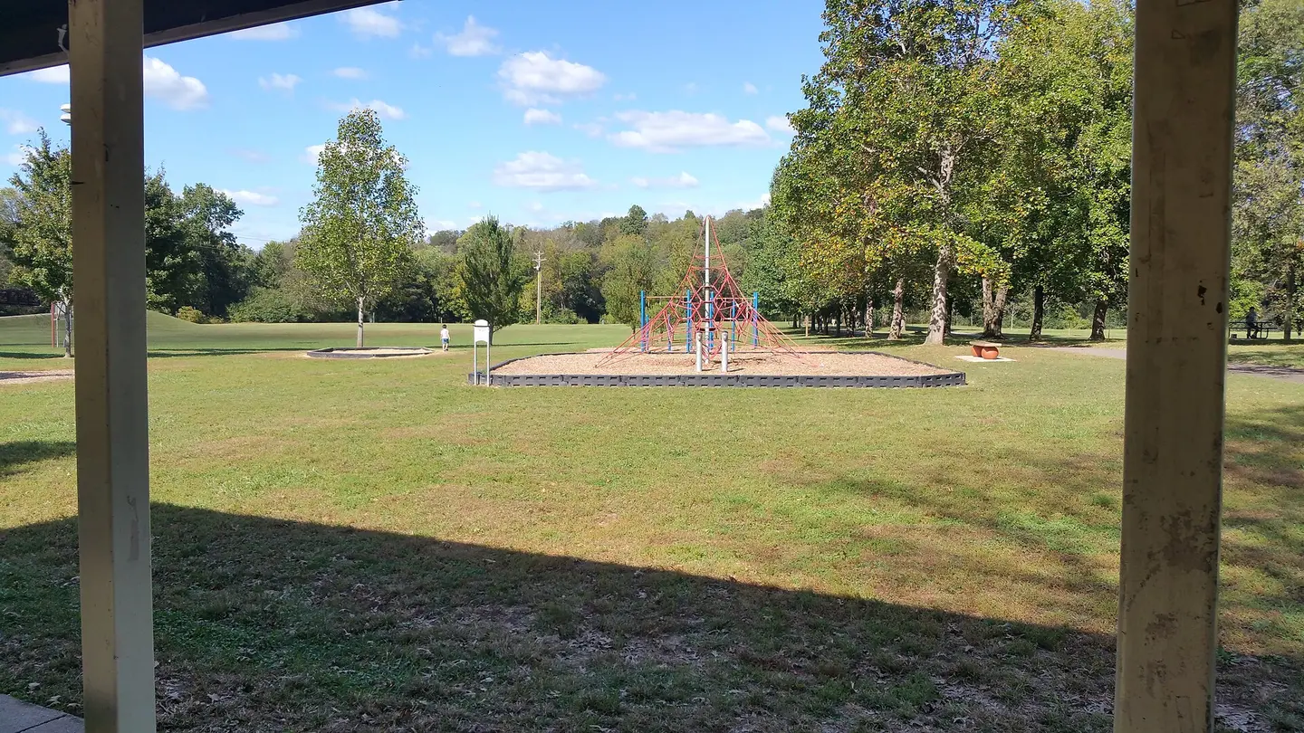 Green lawn, trees and walking area in Pinkerton Park in Franklin, Tennessee